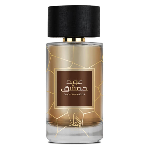 Al Absar Oud Damascus 100ml eau de parfum bottle close up, amber-gold oud fragrance in a clear glass flacon